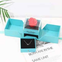 Exquisite eternal rose petals stored in acrylic flip jewelry box