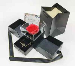 Exquisite eternal rose petals stored in acrylic flip jewelry box