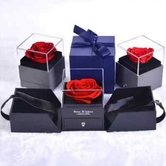Exquisite eternal rose petals stored in acrylic flip jewelry box