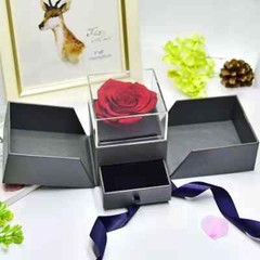 Exquisite eternal rose petals stored in acrylic flip jewelry box