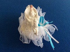 wedding decorations: bride in white carriage w-horse, lilac/white hat, potpourri