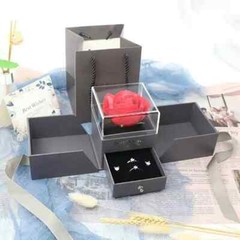 Exquisite eternal rose petals stored in acrylic flip jewelry box