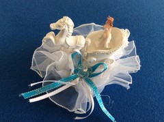 wedding decorations: bride in white carriage w-horse, lilac/white hat, potpourri