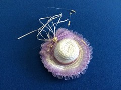 wedding decorations: bride in white carriage w-horse, lilac/white hat, potpourri