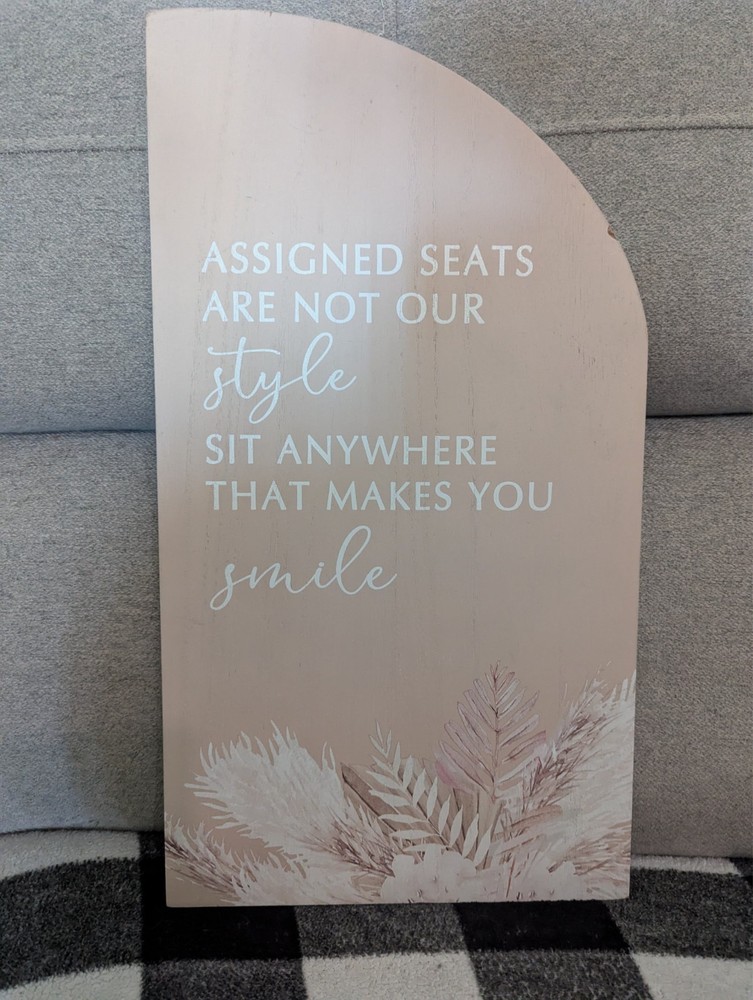 “Assigned Seats Are Not Our Style” Wedding Sign; Simple Florals; 10.5″ x 19″