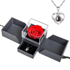 Exquisite eternal rose petals stored in acrylic flip jewelry box