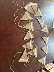 Party banner, stiff tan burlap with lace trim. Approximately 20 feet long