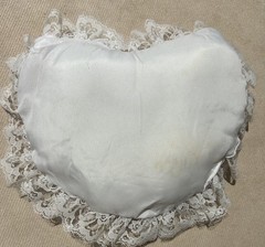 Lace Heart-Shaped Pillow. White With White Lace and Pink Trim. 9”x7”
