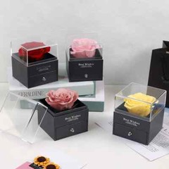 Exquisite eternal flower preserved in an acrylic jewelry box