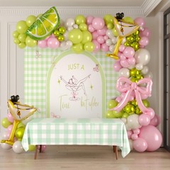 A Tini Bit Older balloon garland arch kit with Pink oilve green balloons Lemo…