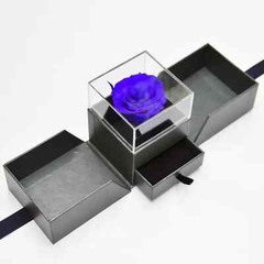 Exquisite eternal rose petals stored in acrylic flip jewelry box