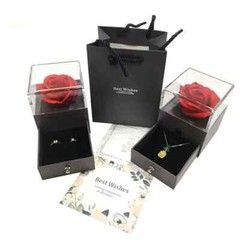 Exquisite eternal flower preserved in an acrylic jewelry box