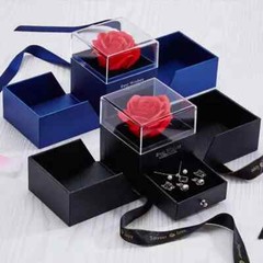 Exquisite eternal rose petals stored in acrylic flip jewelry box