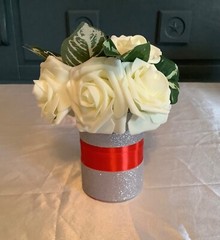 Rose centerpiece embellished with satin and glitter ribbon…you pick colors