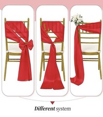 50 new/ 50 used universal black chair covers, 50 used red bow, 10 silver runners