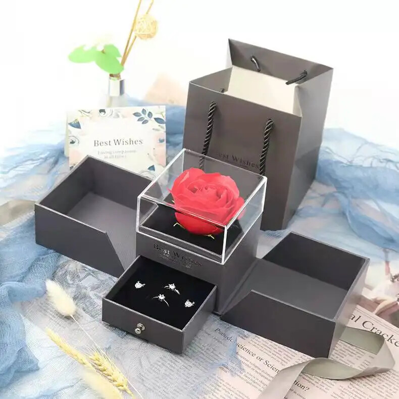 Exquisite eternal rose petals stored in acrylic flip jewelry box