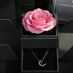 Exquisite eternal flower preserved in an acrylic jewelry box